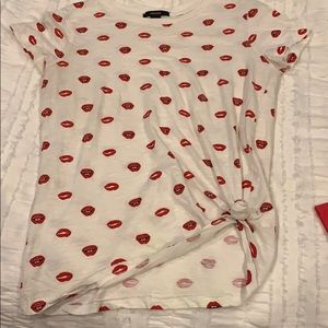 White shirt with lips on it